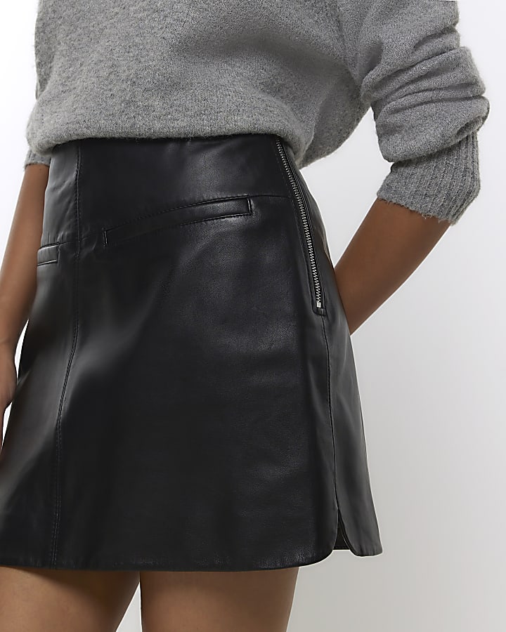 Black leather mini skirt