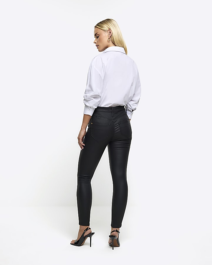 Petite black skinny fit coated jeans