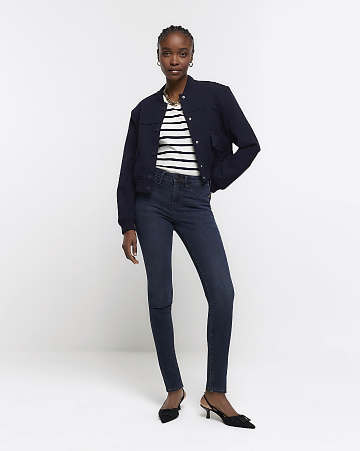 Blue mid rise bum sculpt skinny jeans