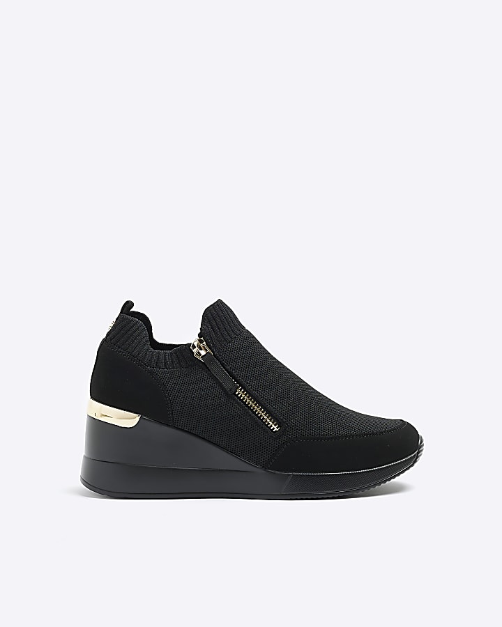 Black slip on wedge trainers