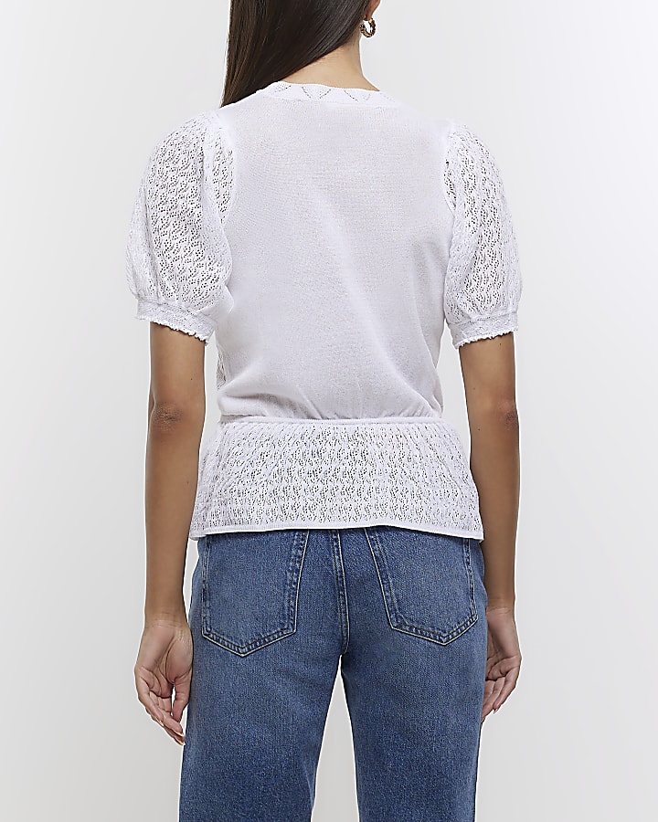 White knitted puff sleeve peplum top