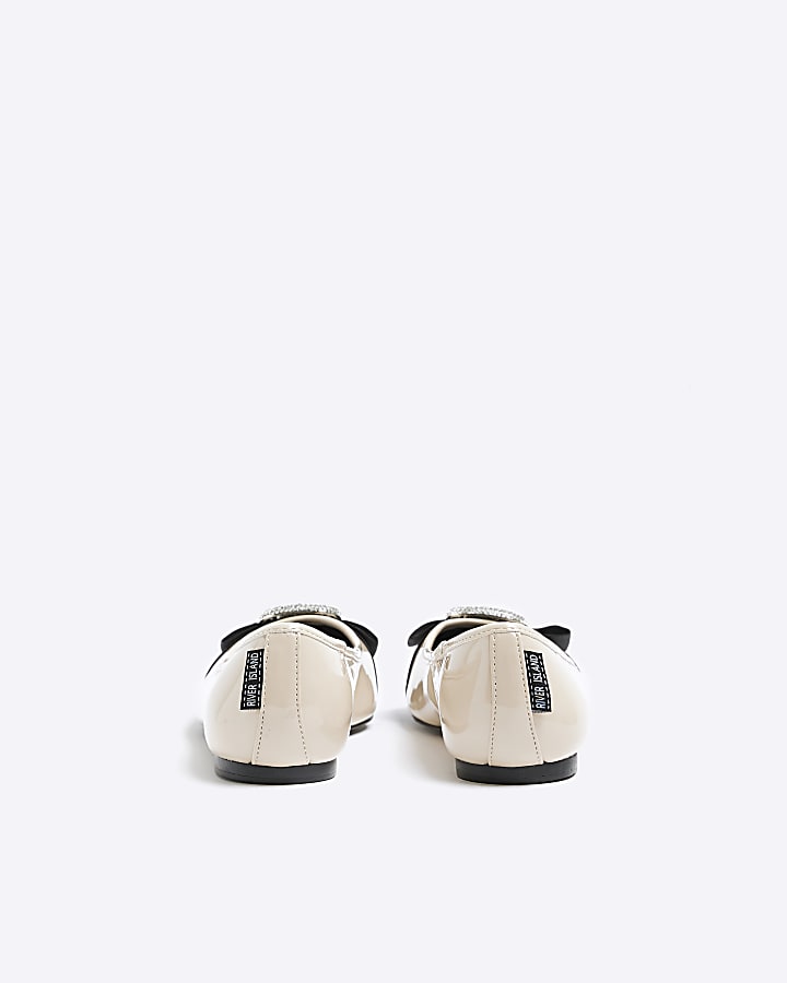 Beige embellished ballet shoes
