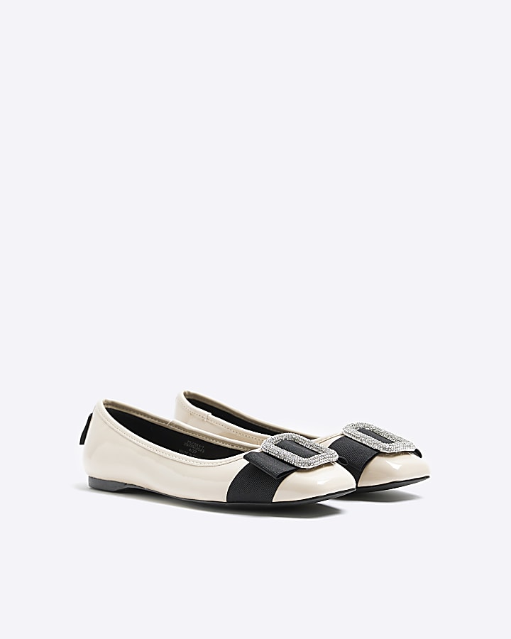 Beige embellished ballet shoes