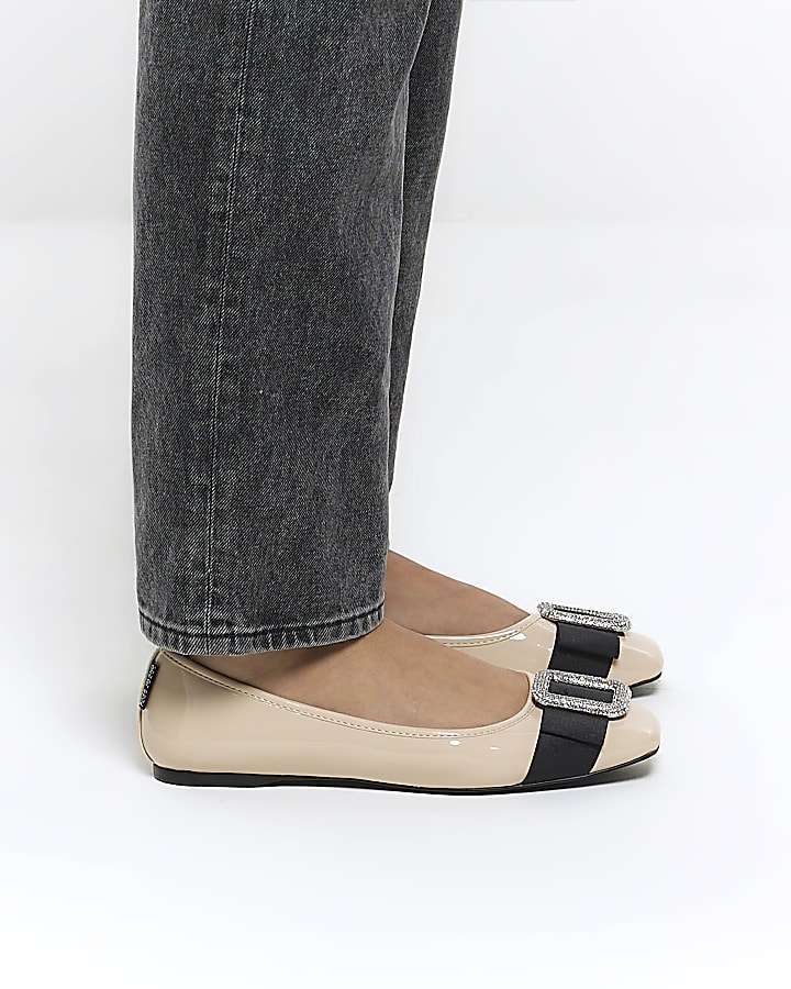 Beige embellished ballet shoes