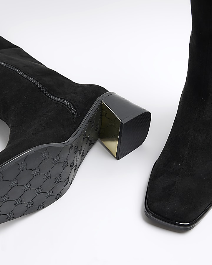 Black high leg heeled boots