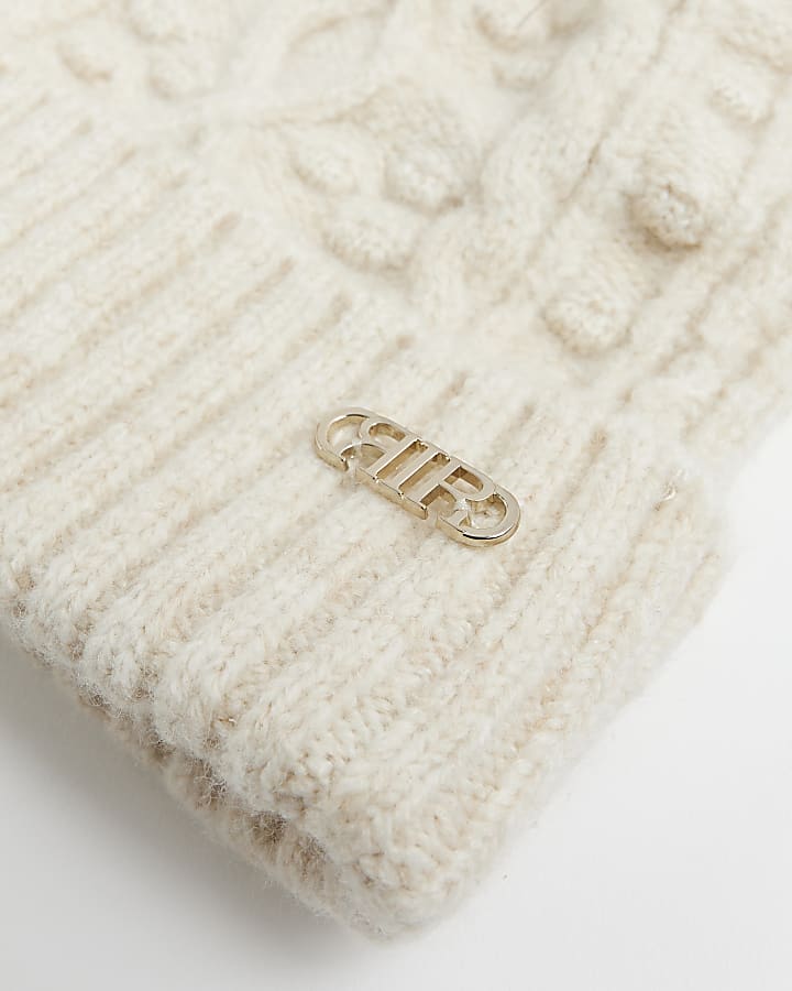 Beige cable knit beanie hat