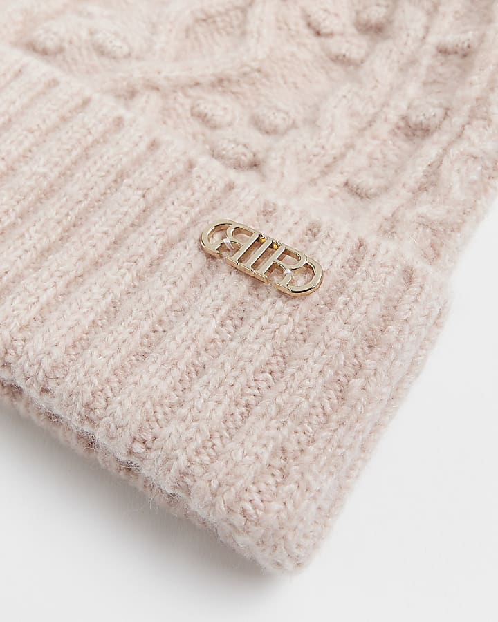 Pink cable knit beanie hat