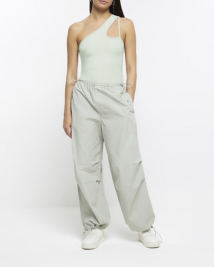 Green cut out one shoulder bodysuit