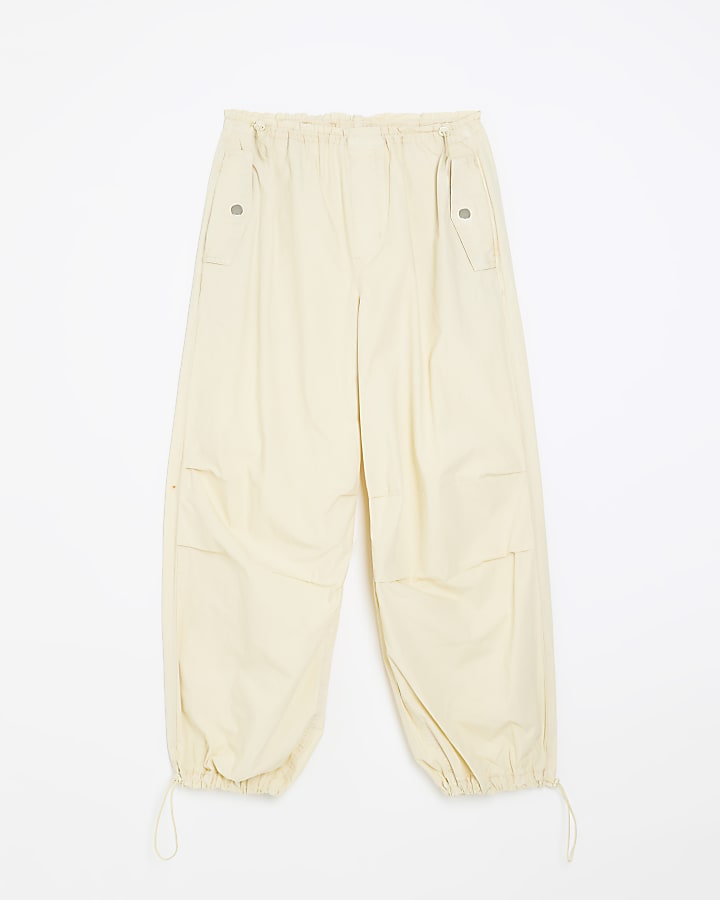 Yellow baggy low rise parachute trousers