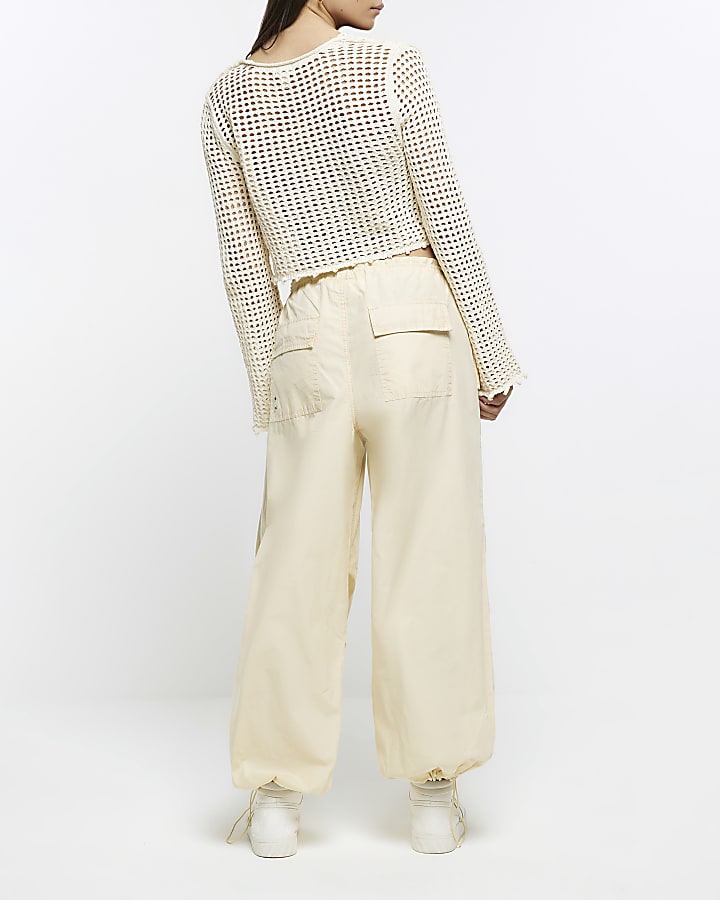 Yellow baggy low rise parachute trousers