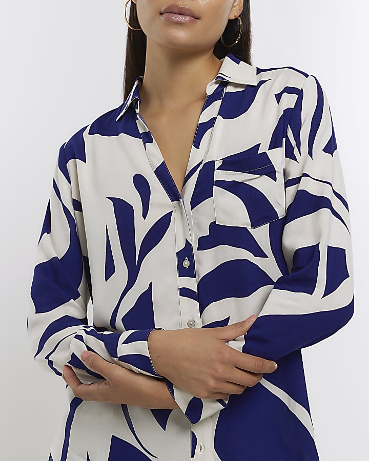 Blue abstract print open neck shirt