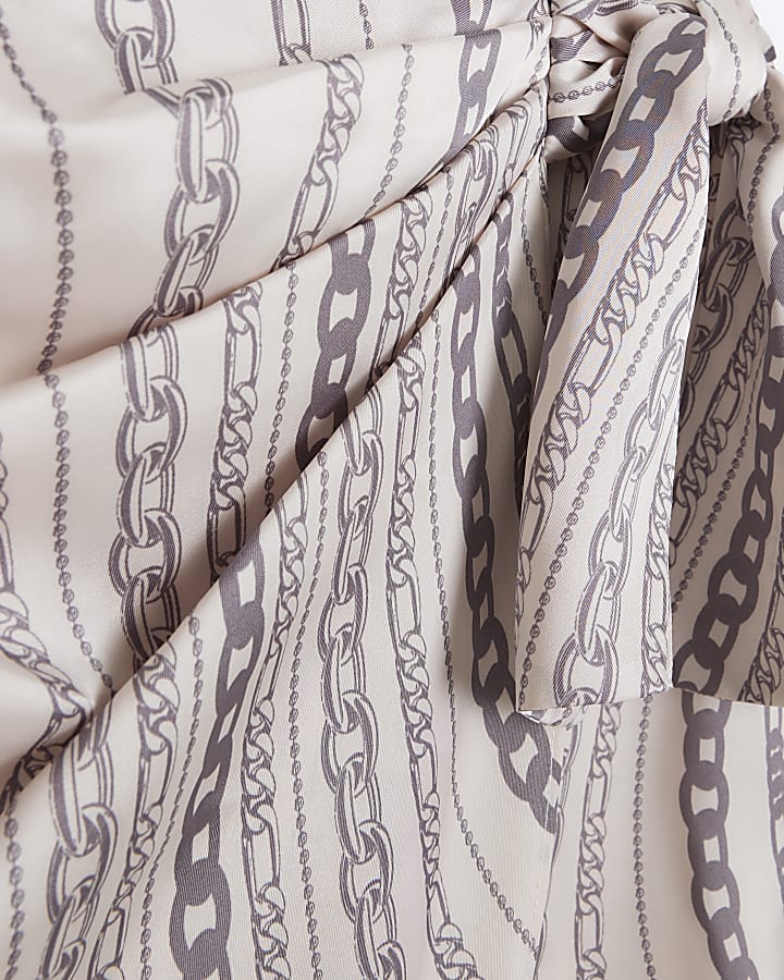 White chain print wrap mini skirt