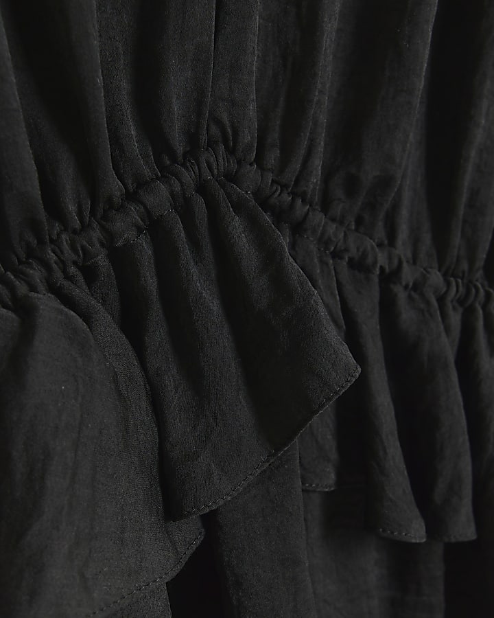 Black ruffle blouse