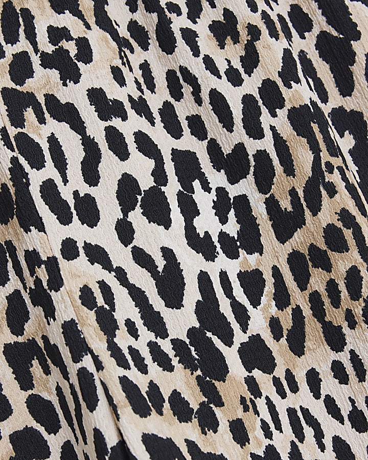 Plus beige leopard print flare trousers