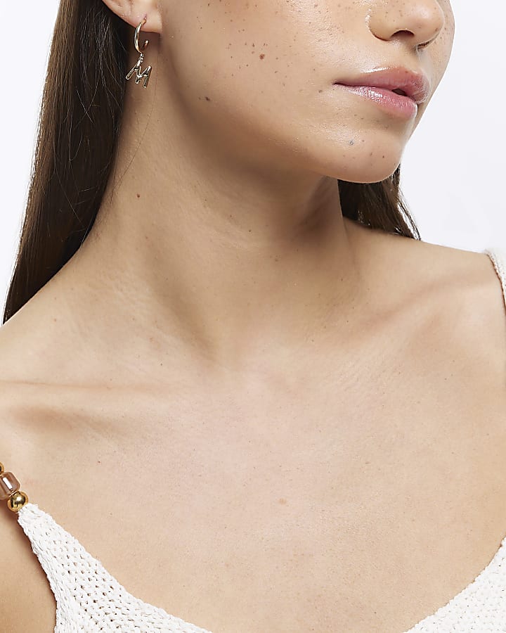 Gold M initial hoop earrings