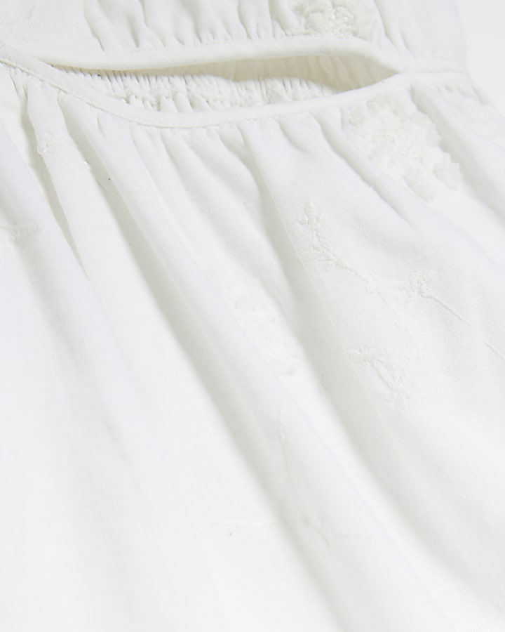 White textured cut out playsuit
