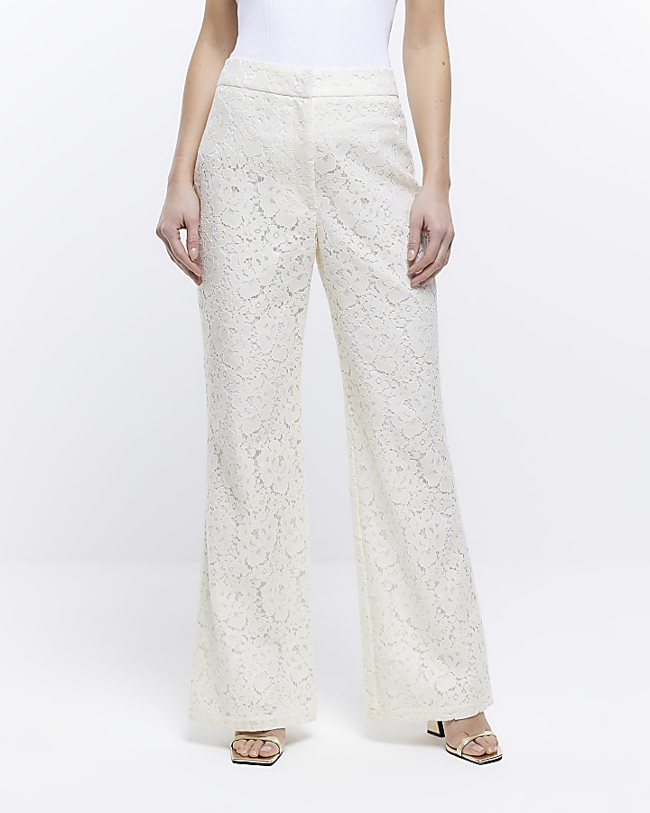 Cream lace flared trousers