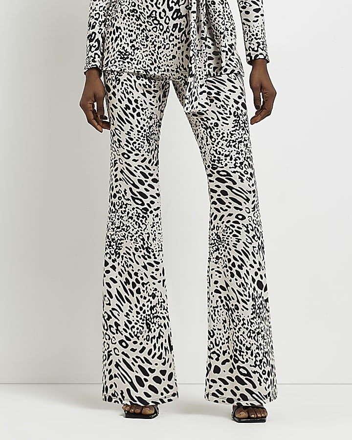 Black jacquard leopard print flare trousers