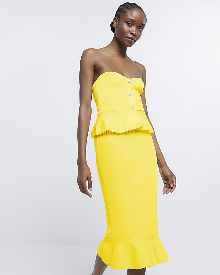 Yellow peplum hem midi skirt