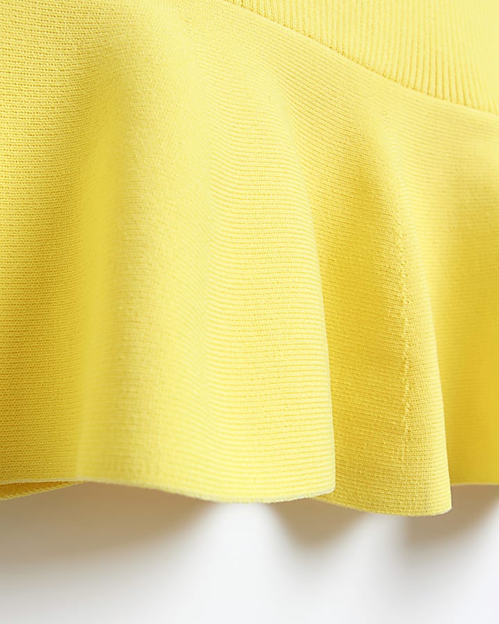 Yellow peplum hem midi skirt