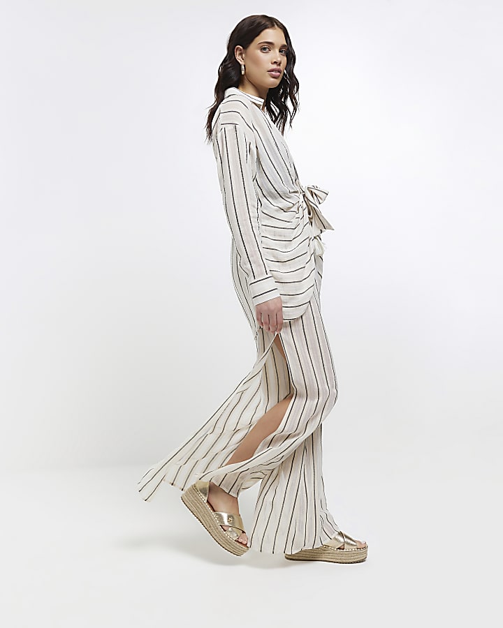Beige sheer stripe split hem trousers