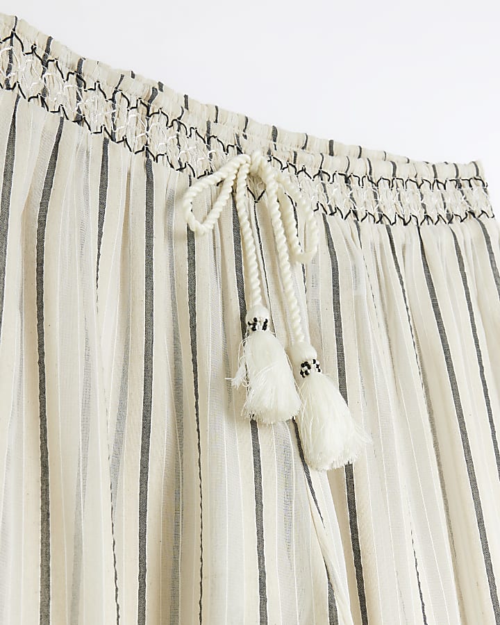 Beige sheer stripe split hem trousers