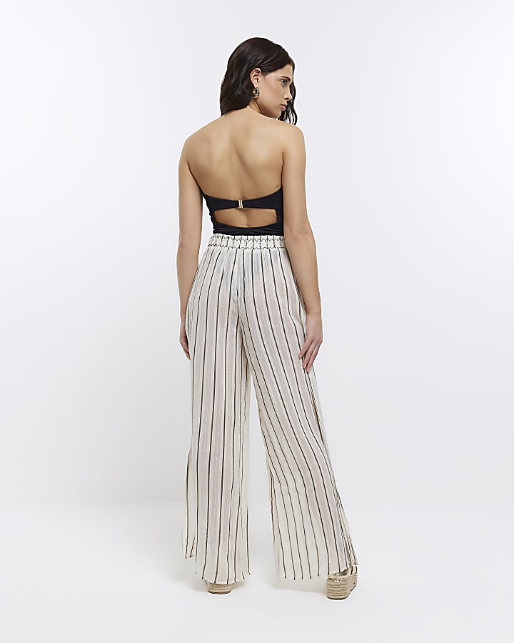 Beige sheer stripe split hem trousers