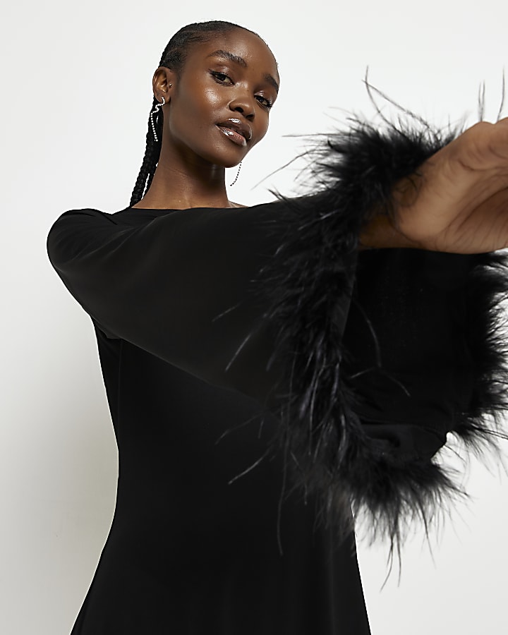 Black one shoulder feather trim shift dress
