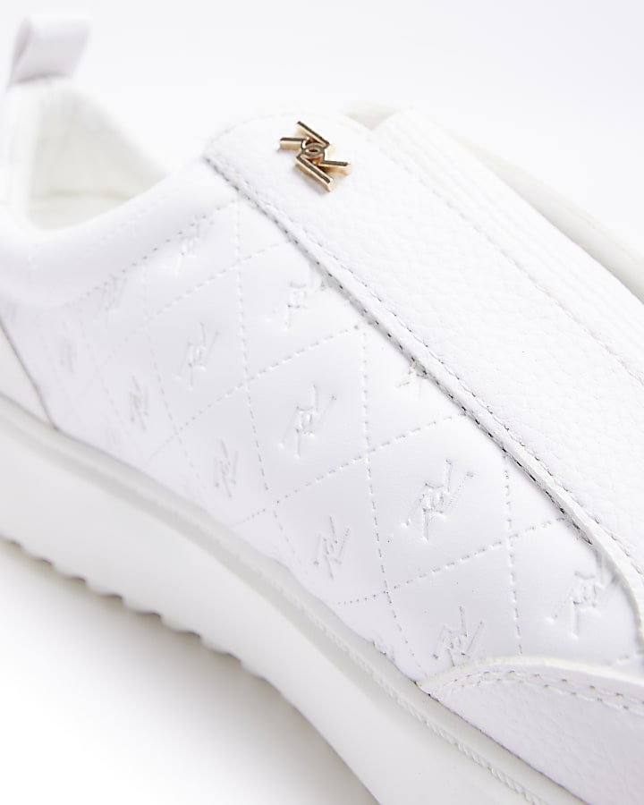 White embossed RI monogram trainers