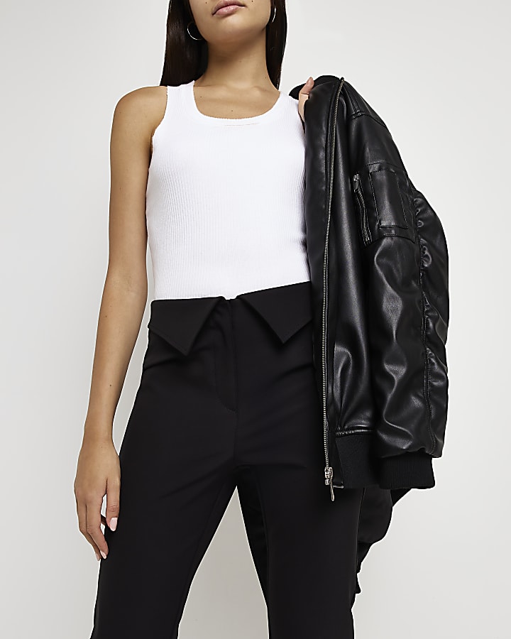 Black fold over skinny trousers