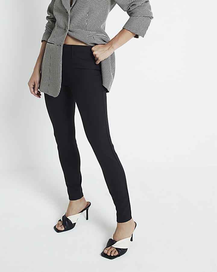 Black mid rise skinny trousers