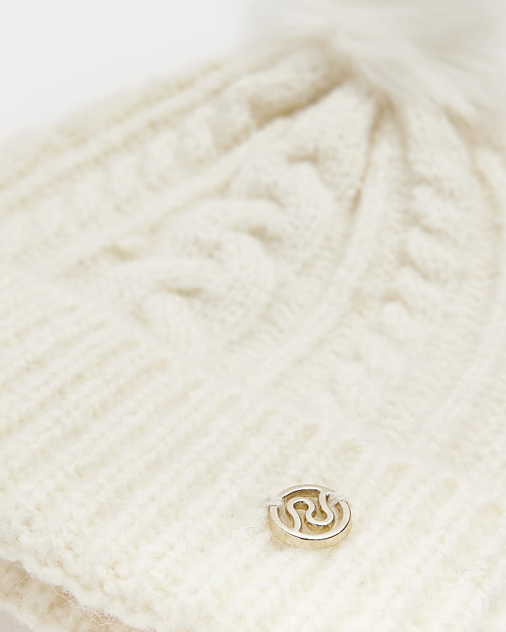 Cream pom pom cable knit beanie hat