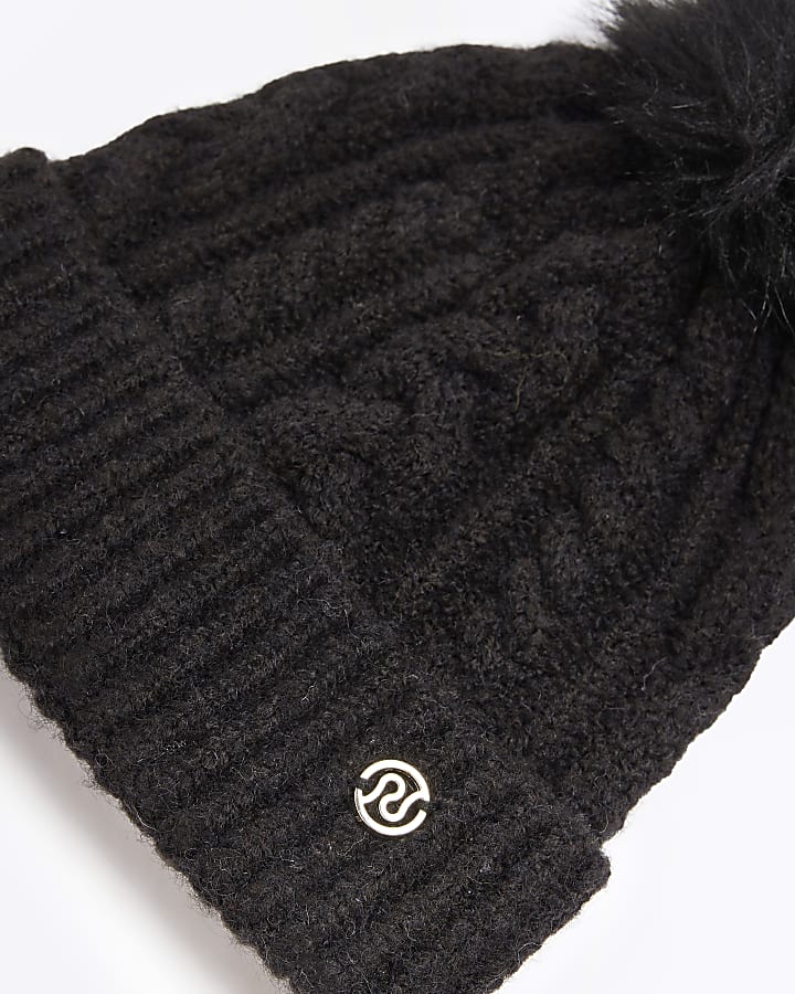 Black pom pom cable knit beanie hat