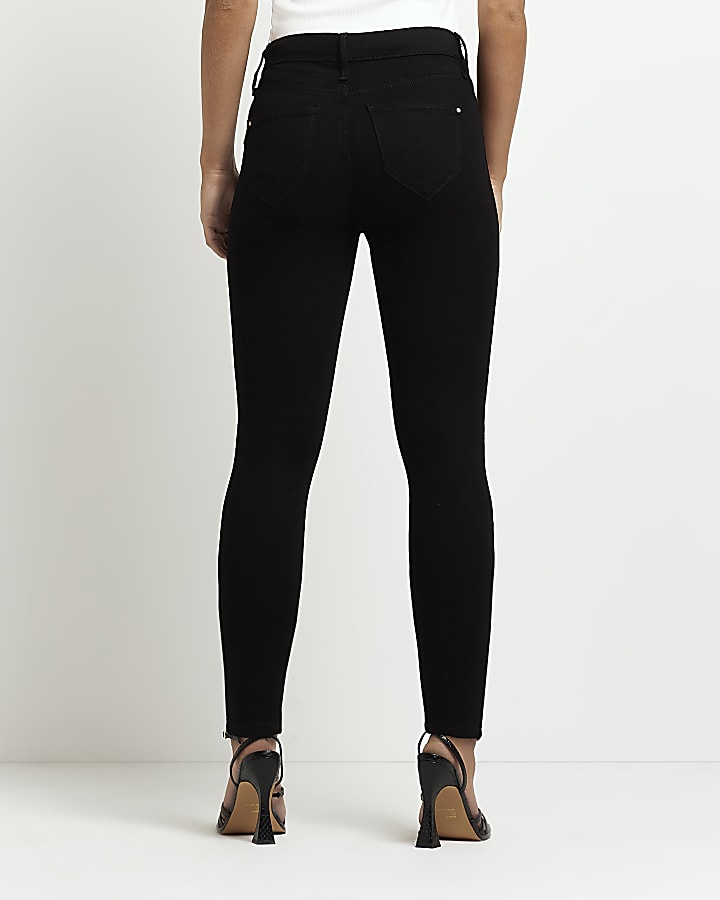 Petite black Molly mid rise skinny jeans