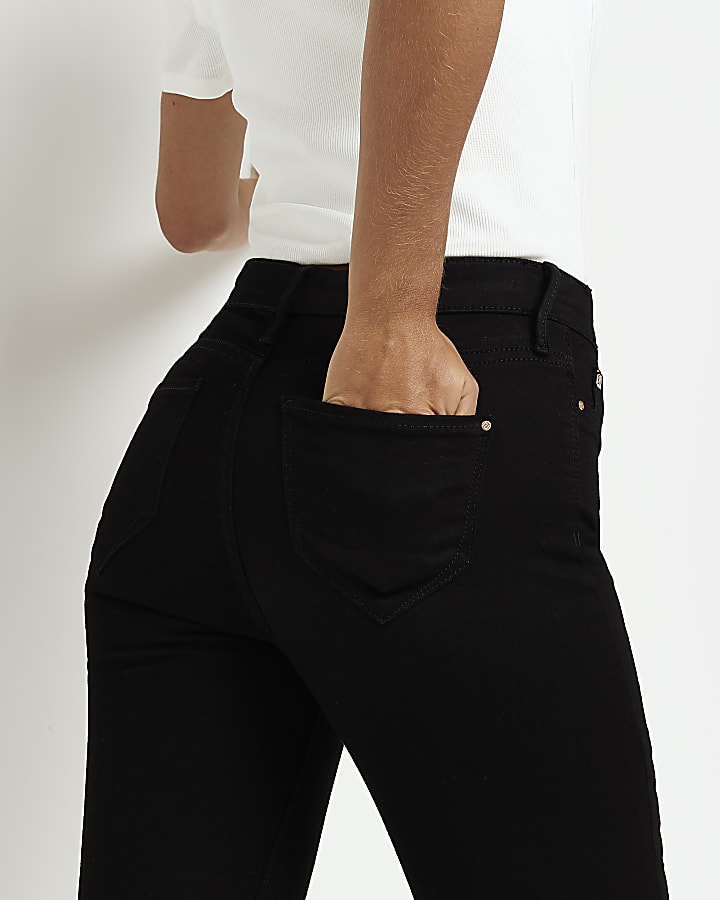 Petite black Molly mid rise skinny jeans