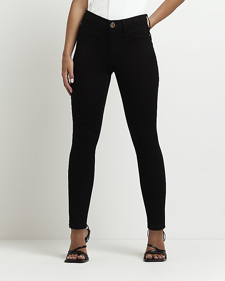 Petite black Molly mid rise skinny jeans