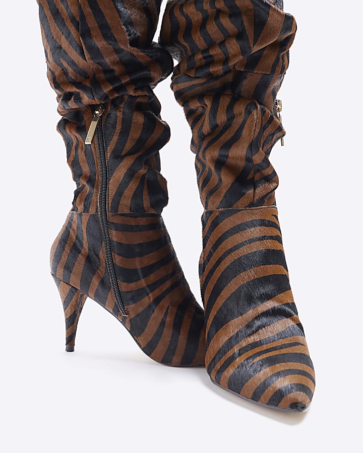 Brown animal print suede knee high boots