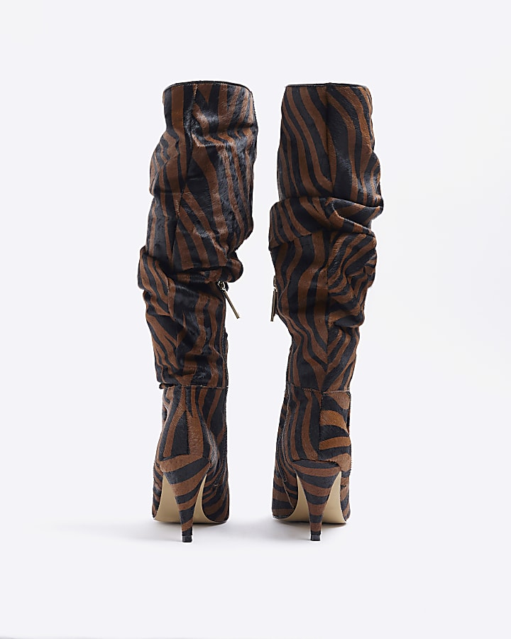 Brown animal print suede knee high boots