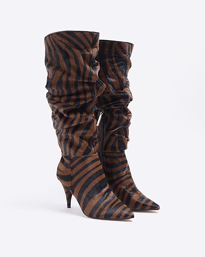 Brown animal print suede knee high boots