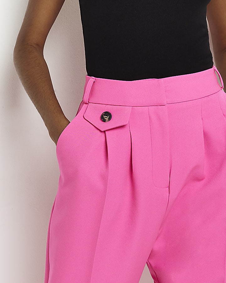 Pink pleated tapered trousers