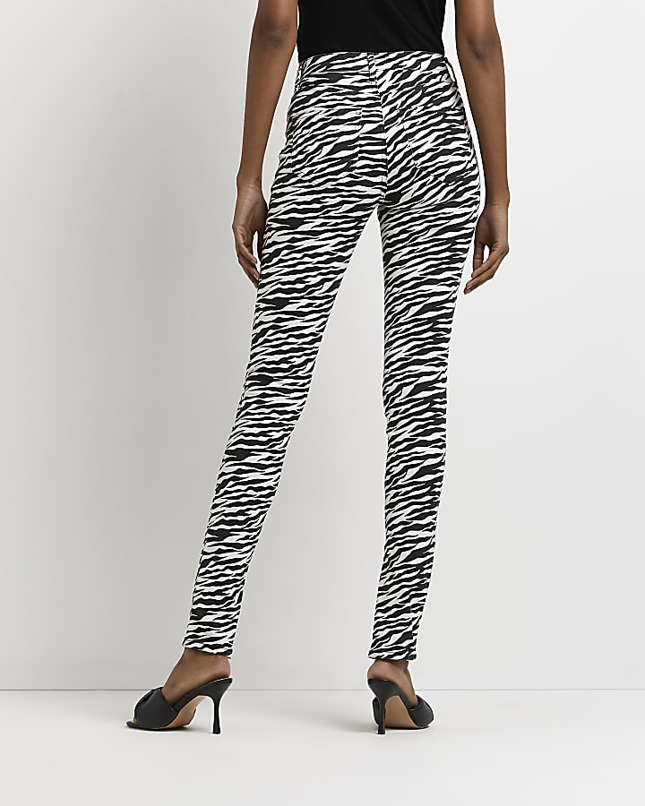 Black zebra bum sculpt skinny jeans