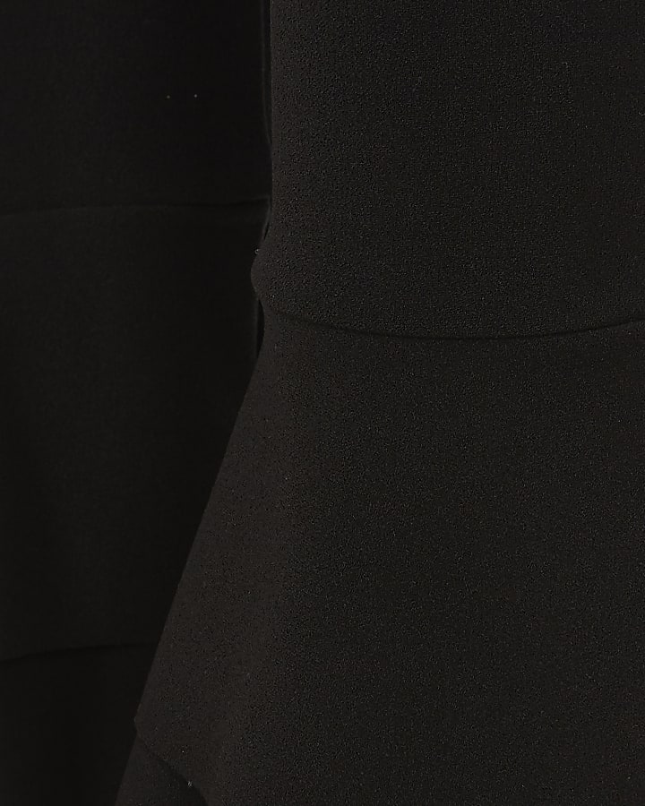 Girls black ruffle hem leggings