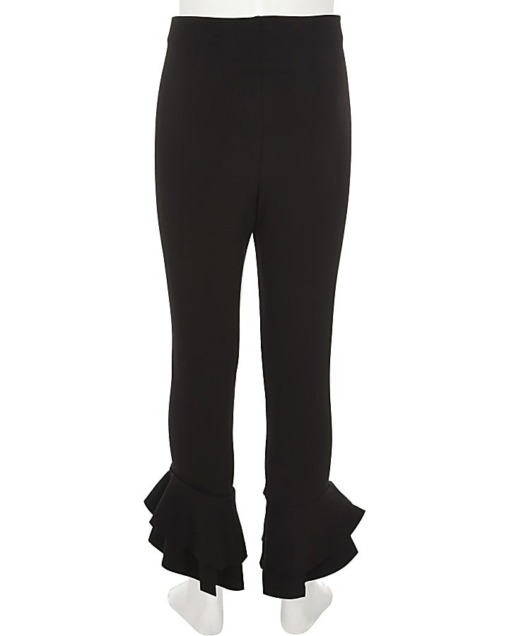 Girls black ruffle hem leggings