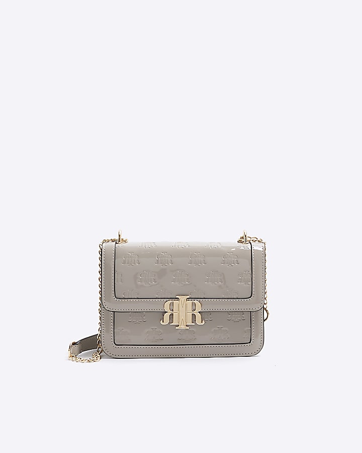 Grey embossed RI lock shoulder bag River Island