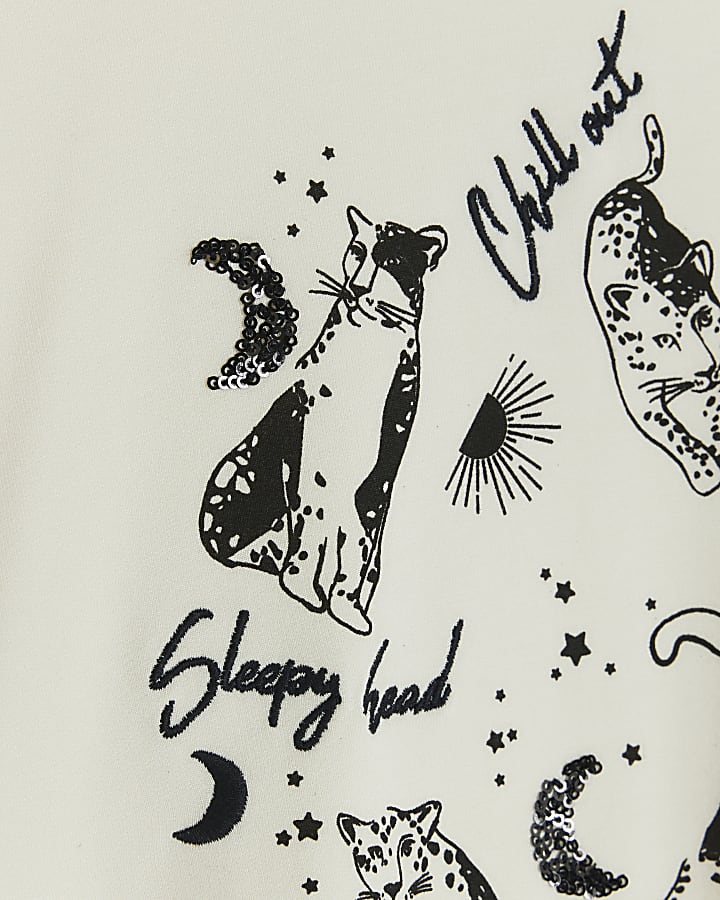 Cream graphic long sleeve lounge top