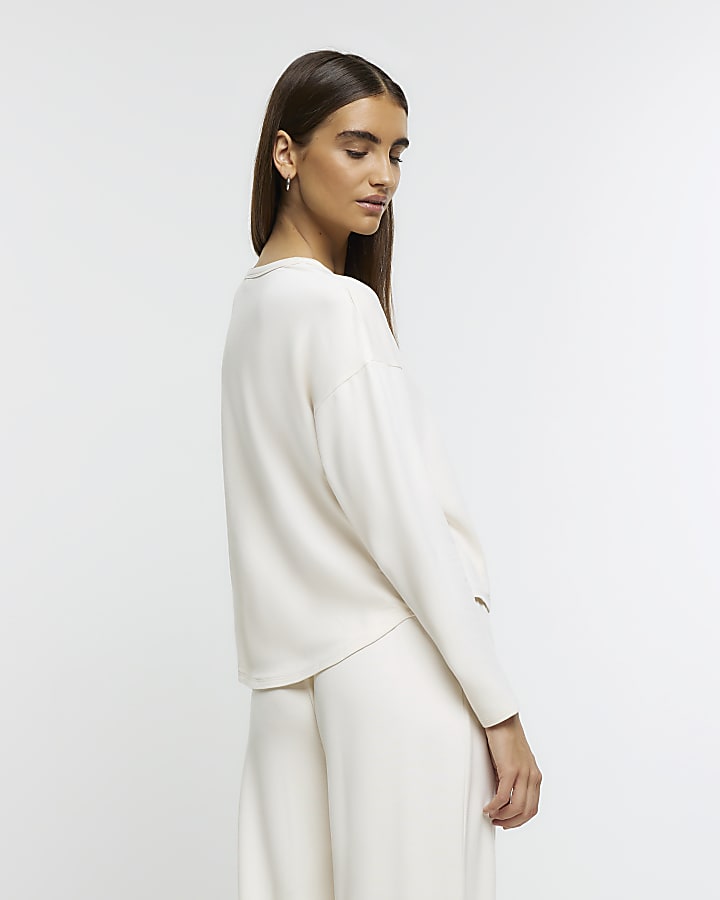 Cream graphic long sleeve lounge top