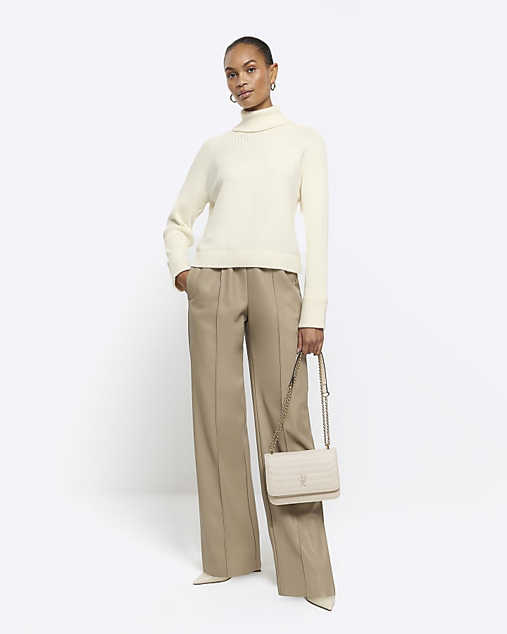 Cream rib roll neck jumper