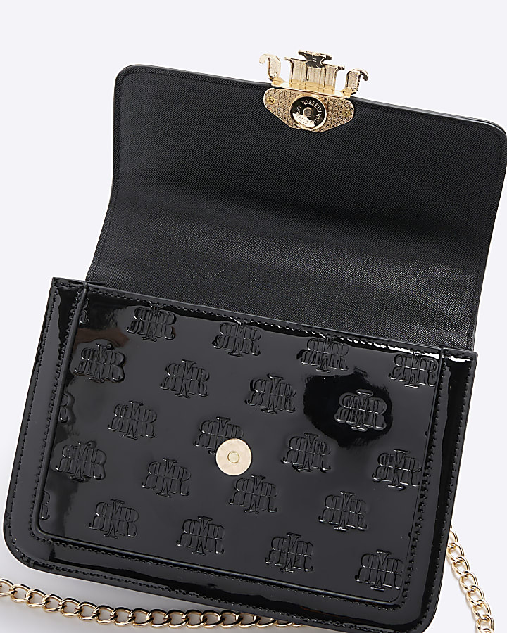 Black embossed RI lock shoulder bag