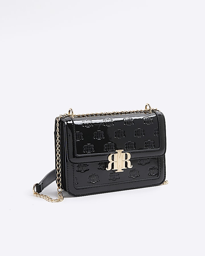 Black embossed RI lock shoulder bag