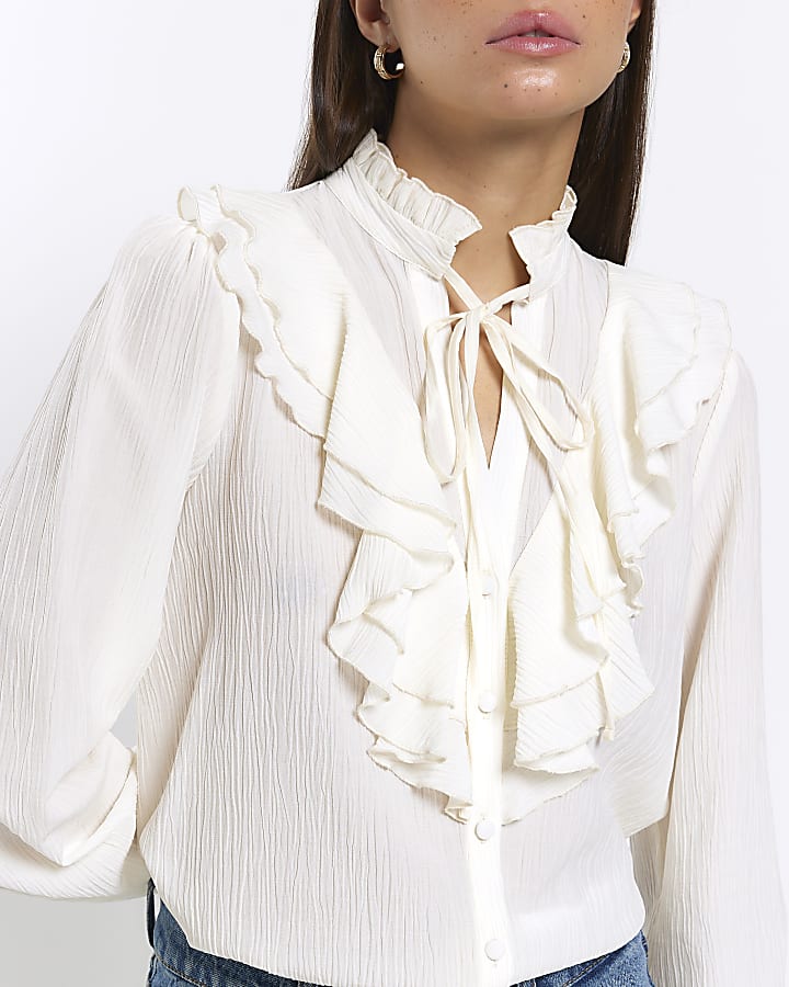 Cream frill long sleeve blouse